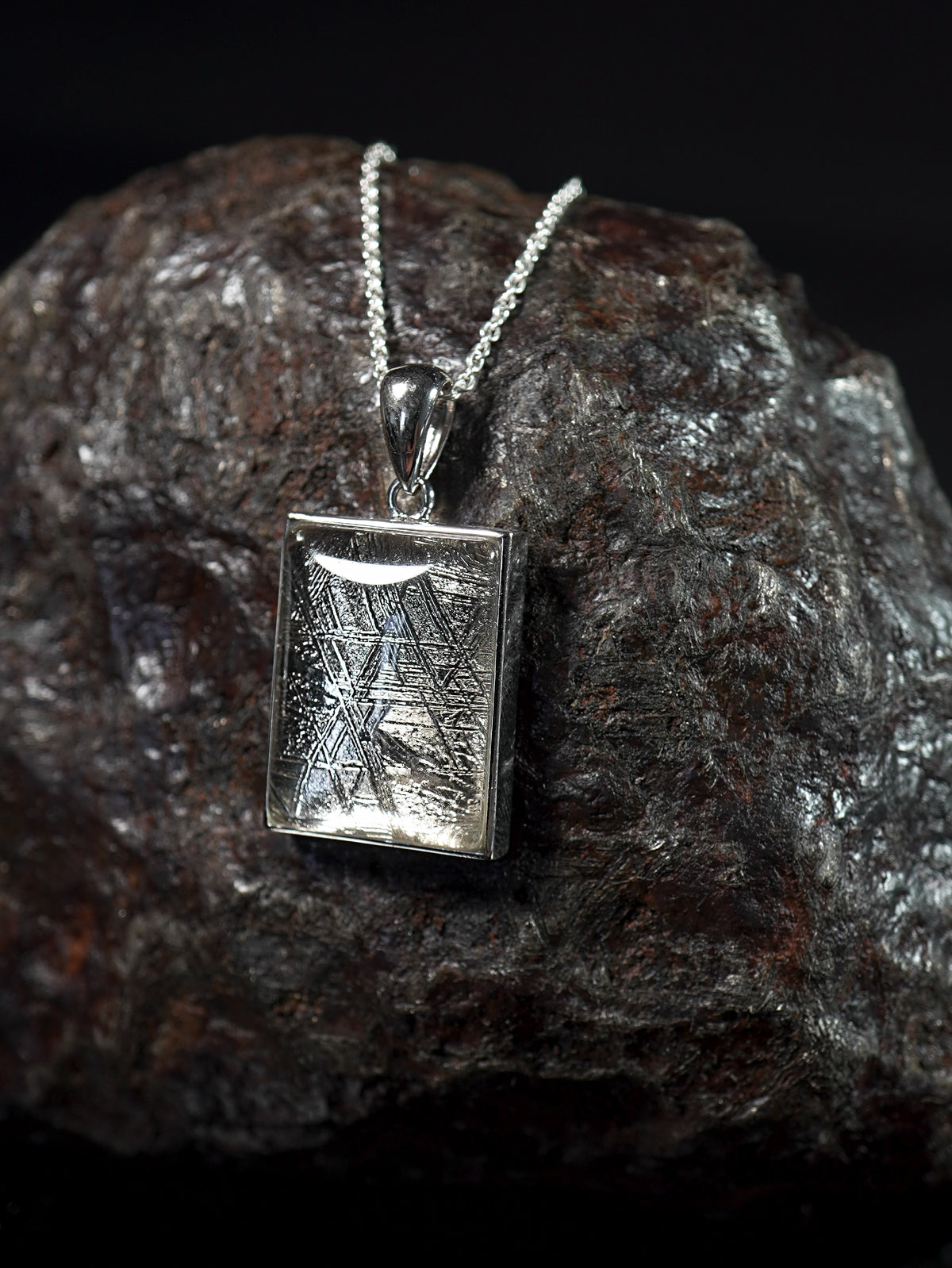 Cosmic Window pendant made with Muonionalusta meteorite