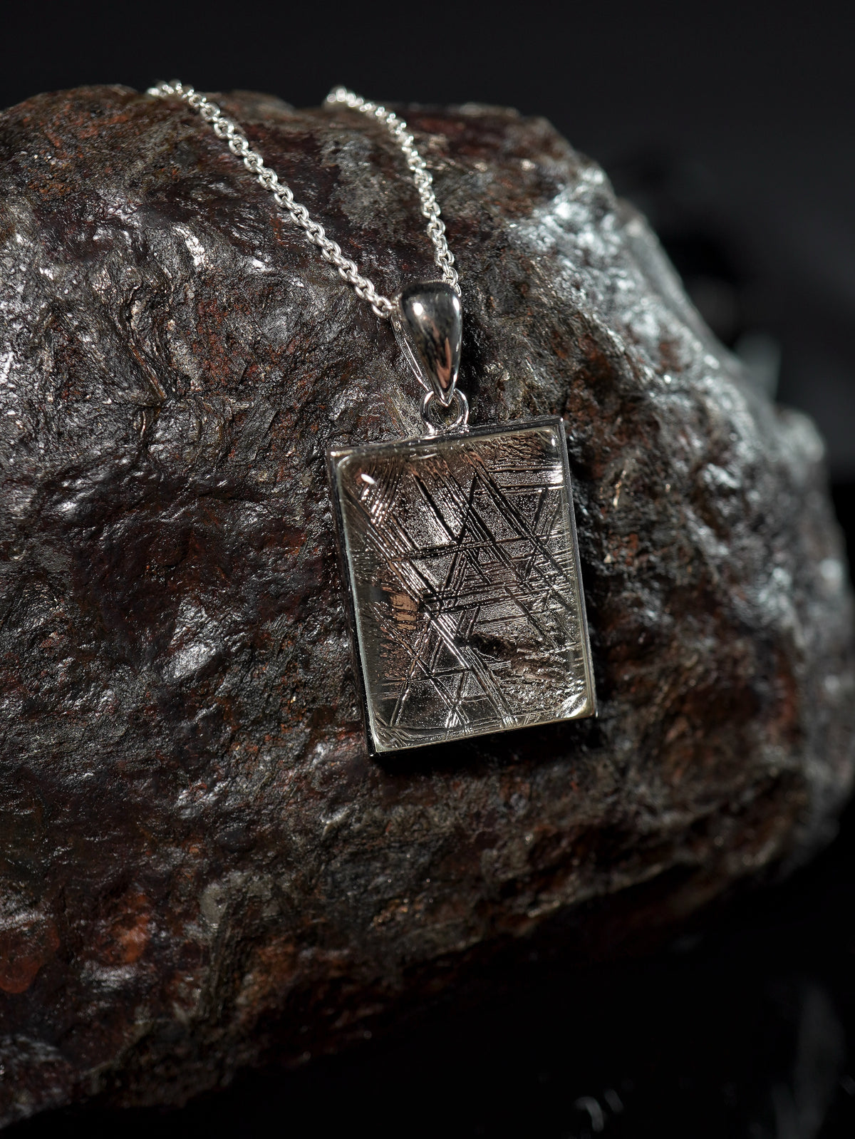 Cosmic Window pendant made with Muonionalusta meteorite