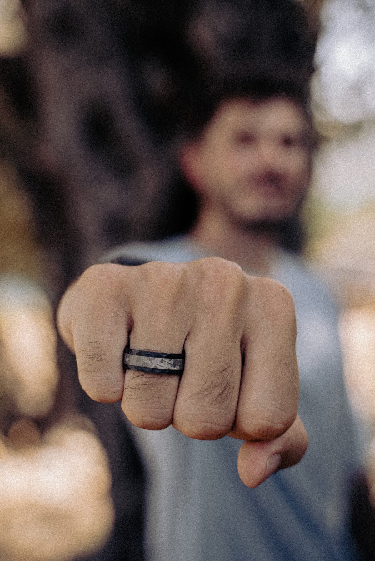 Stunning meteorite ring with black tungsten band, showcasing a genuine Muonionalusta fragment. Unique and stylish meteorite jewelry, combining cosmic beauty with contemporary design, unique meteorite ring