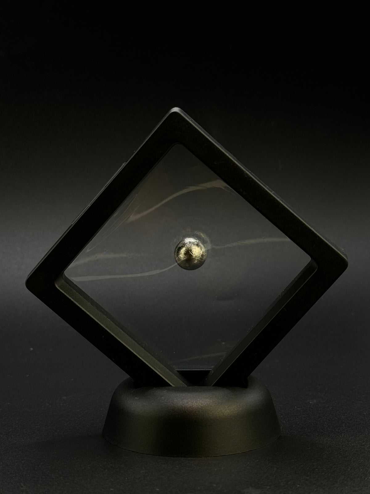 Muonionalusta meteorite, Sweden. 1cm sphere with display.