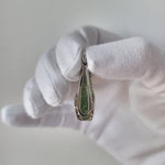 Raw moldavite pendant