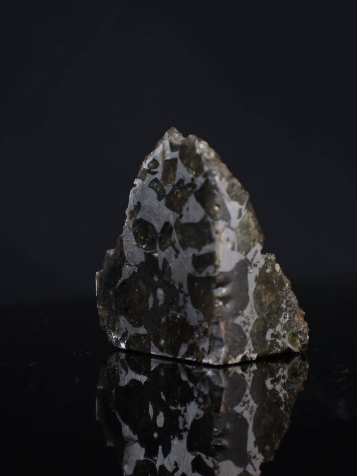 Seymchan meteorite, Russia. 44 grams end-cut.