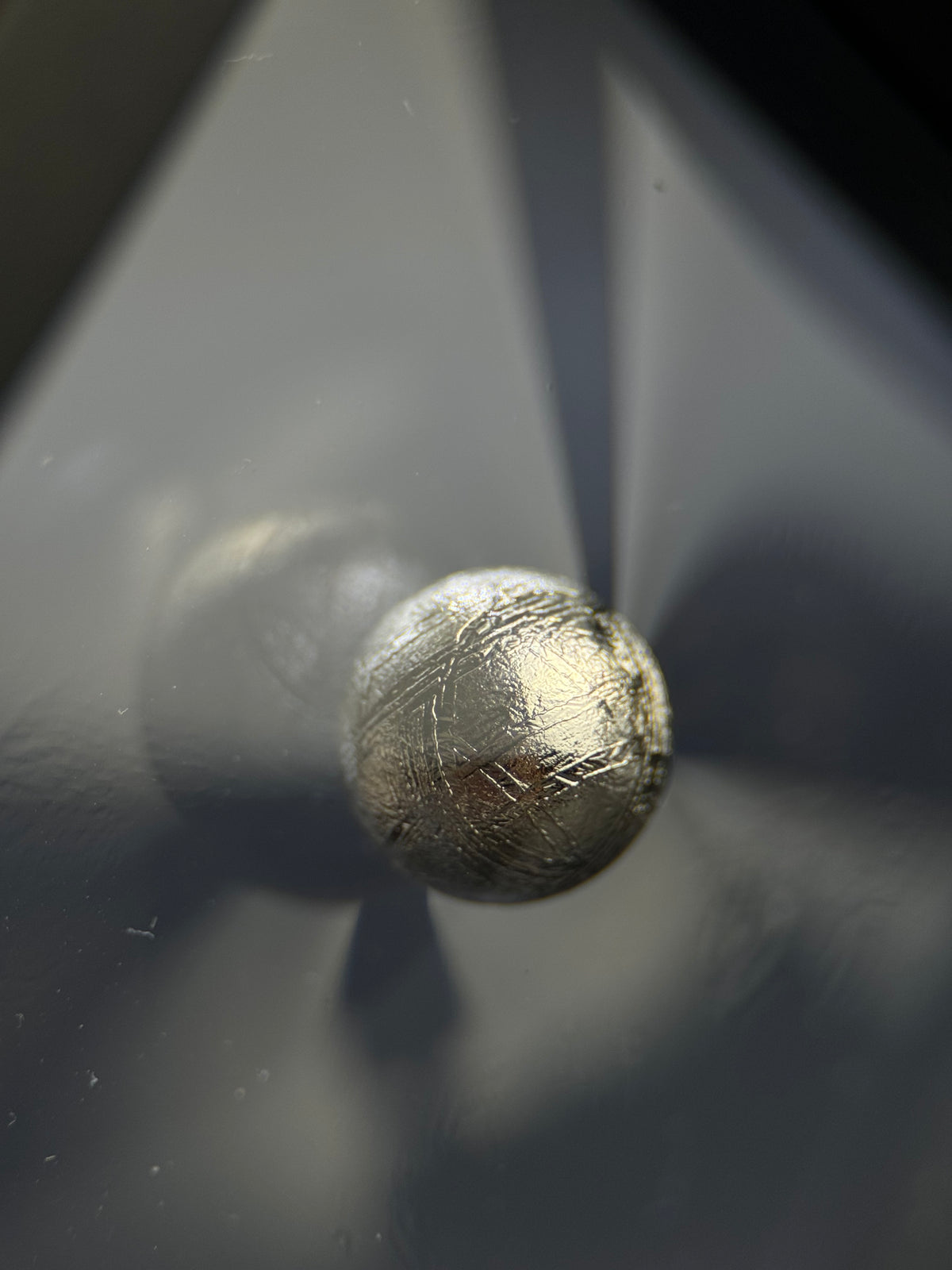 Muonionalusta meteorite, Sweden. 1cm sphere with display.
