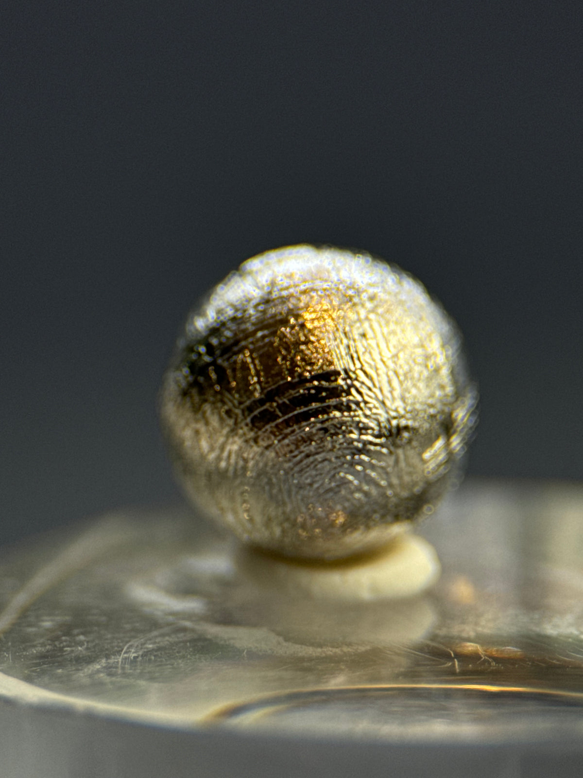 Muonionalusta meteorite, Sweden. 1cm sphere with display.