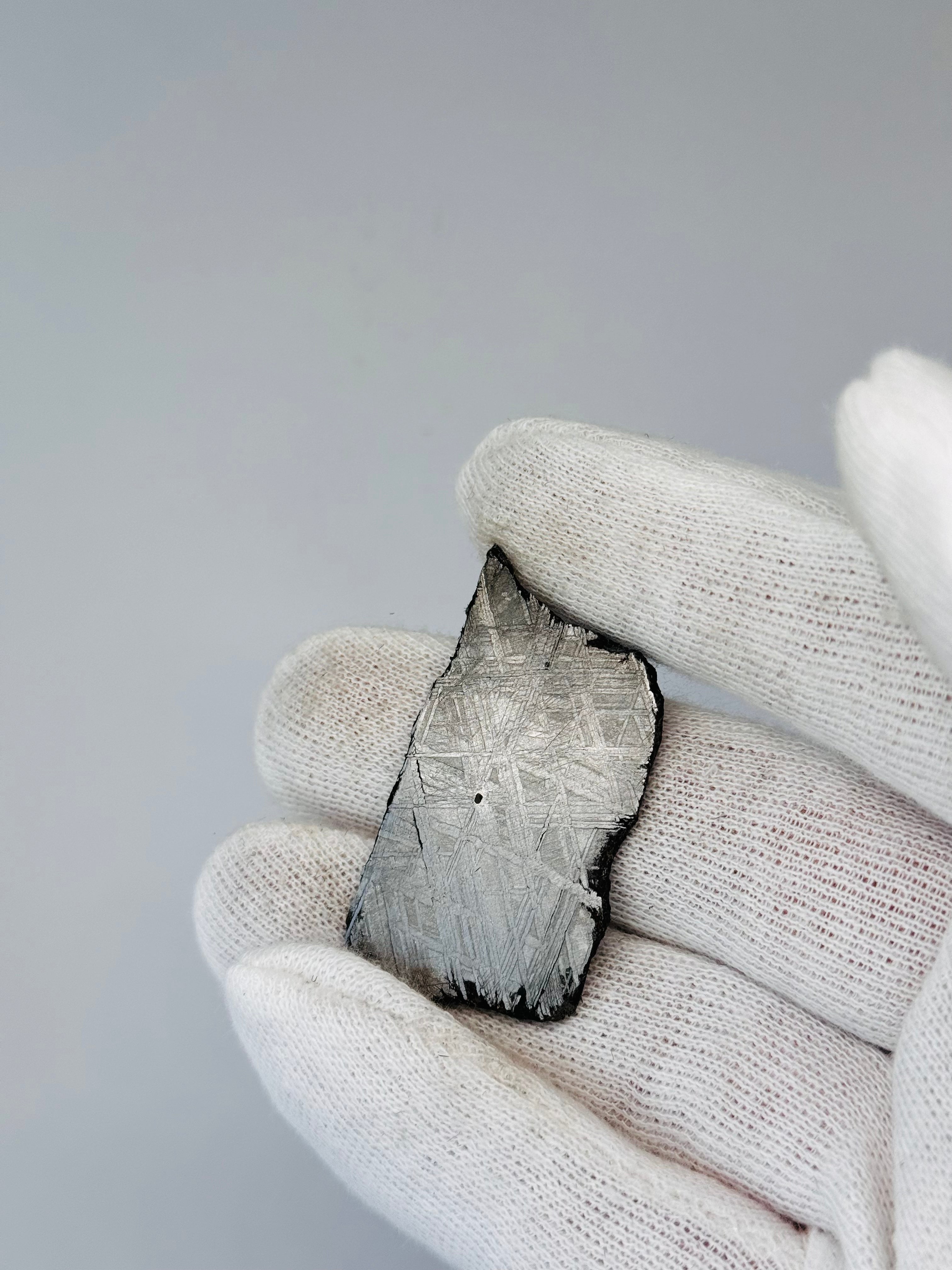 Muonionalusta Meteorite, Sweden. 18,72 grams slice.