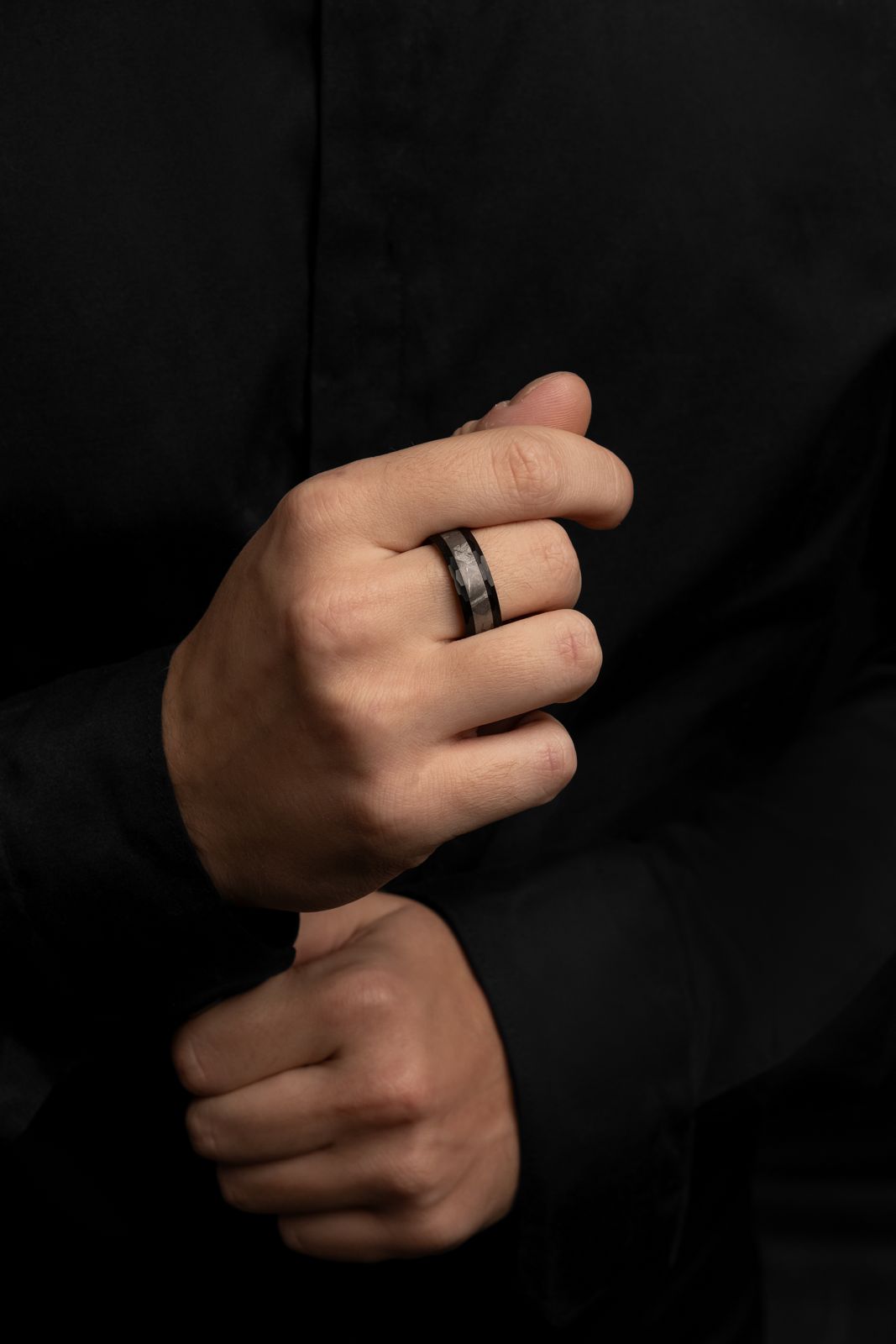 Stunning meteorite ring with black tungsten band, showcasing a genuine Muonionalusta fragment. Unique and stylish meteorite jewelry, combining cosmic beauty with contemporary design, unique meteorite ring