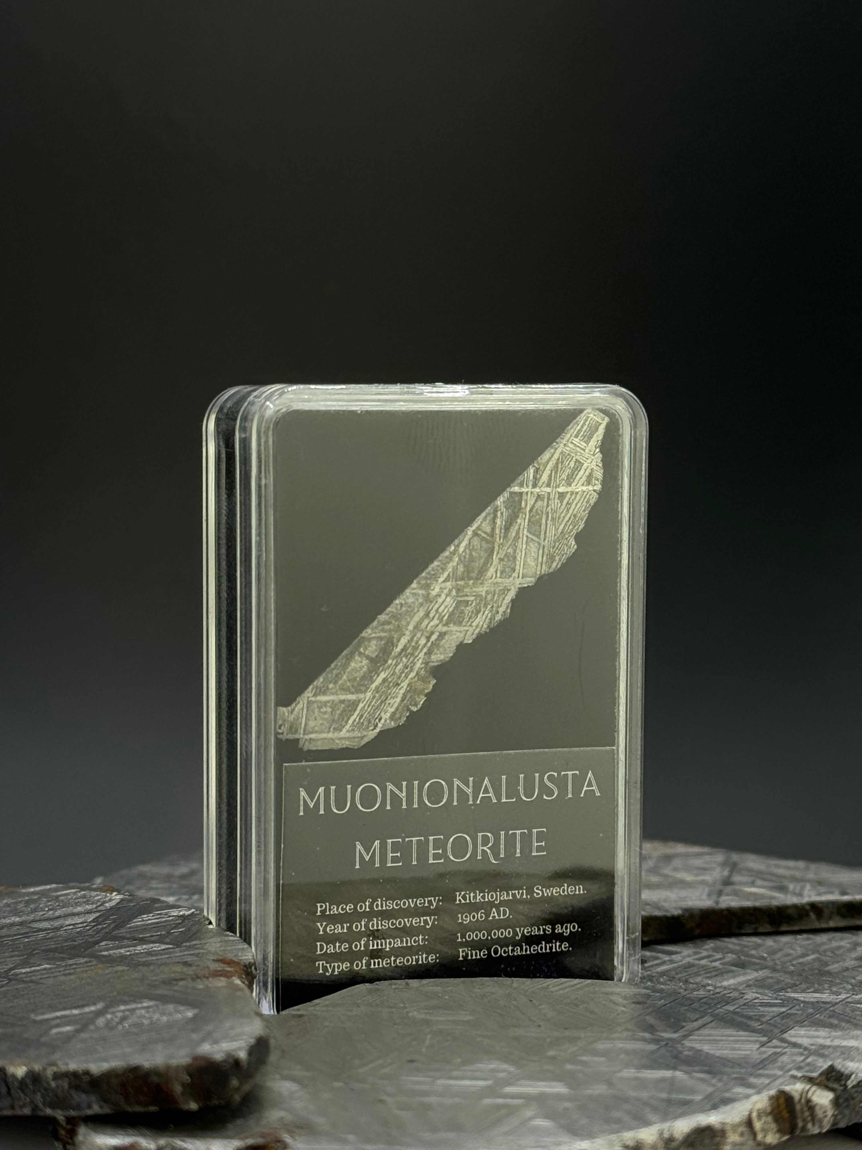 Muonionalusta meteorite, Sweden. 2 grams. Inside of a Display box.