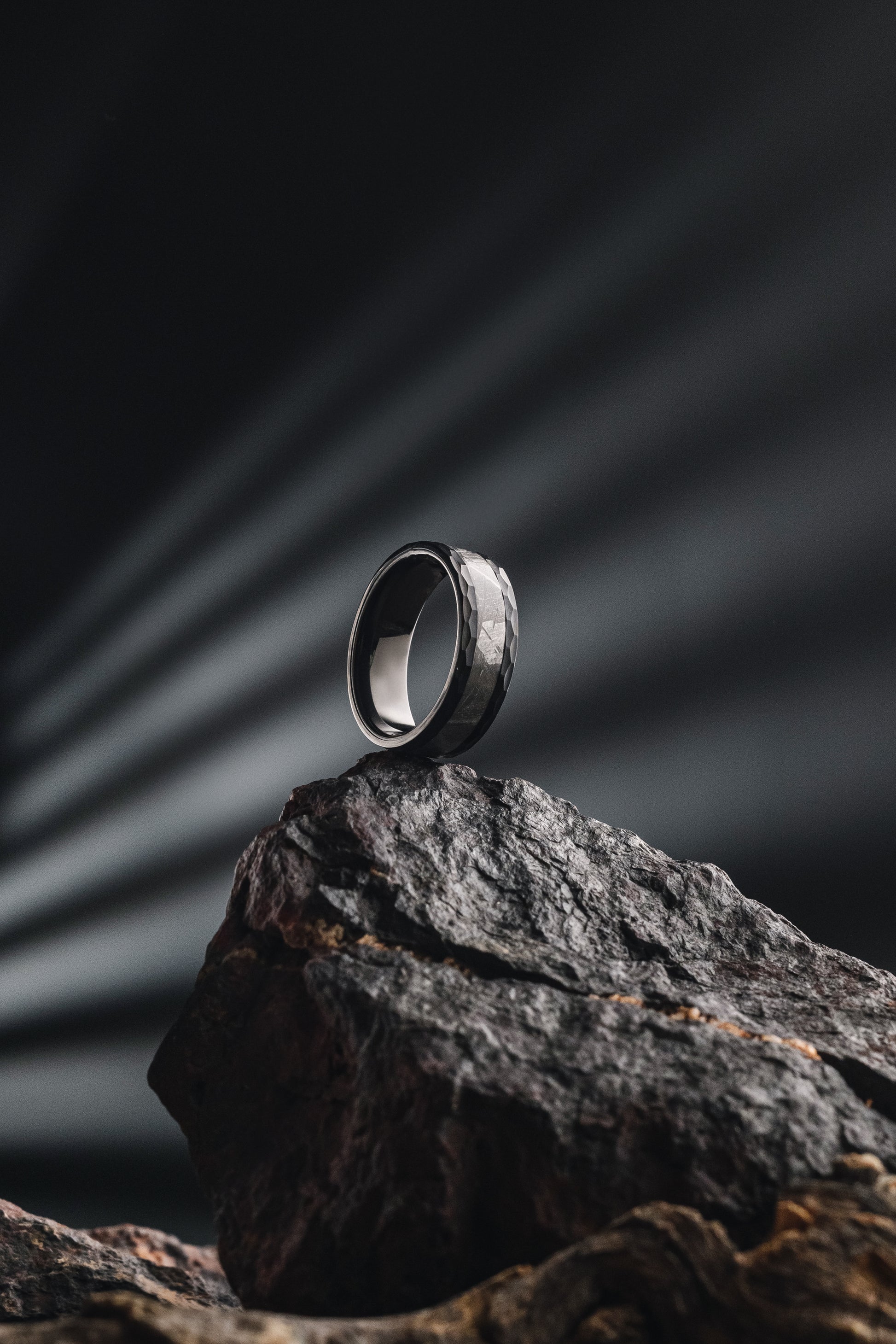 Stunning meteorite ring with black tungsten band, showcasing a genuine Muonionalusta fragment. Unique and stylish meteorite jewelry, combining cosmic beauty with contemporary design, unique meteorite ring