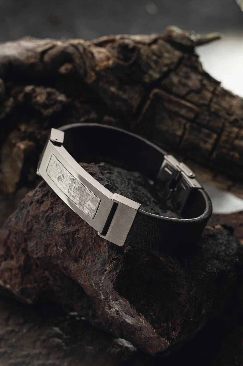 Muonionalusta meteorite bracelet, meteorite jewelry collection. Genuine meteorite bracelet featuring a stylish leather strap for a unique and timeless accessory.