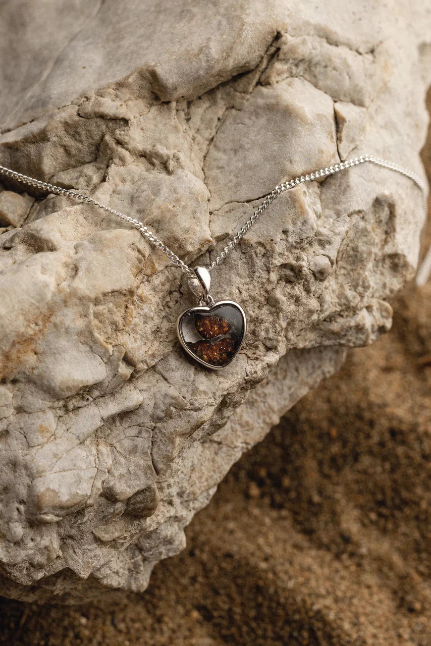 Genuine Sericho meteorite pendant in the shape of a Heart, with silver setting. Authentic meteorite jewelry