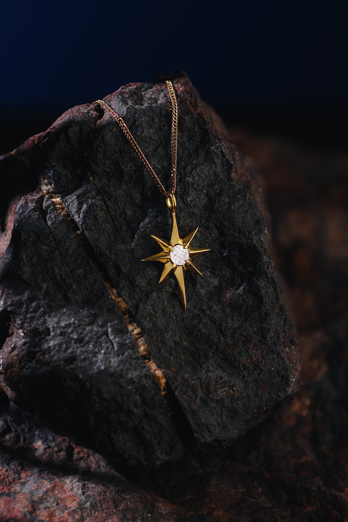 North Star pendant with Muonionalusta meteorite, gold plated.